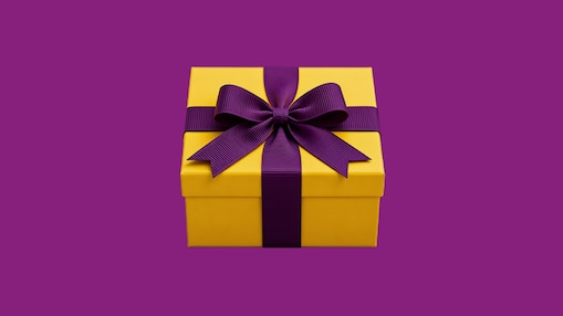 Ilustração de caixa de presente na cor amarela, com fita roxa formando um laço, e aplicada sobre fundo roxo