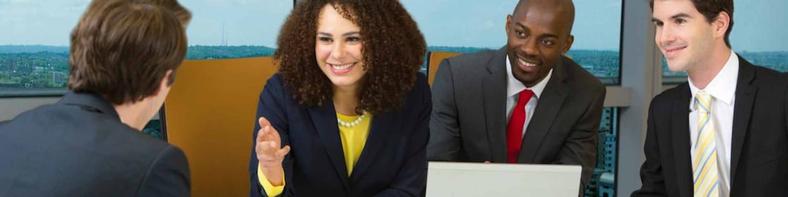 four shell employees in a meeting 