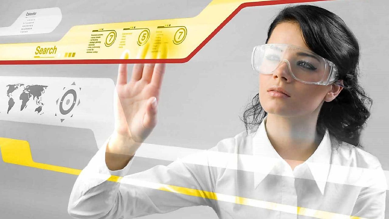 Woman working with a digital touch screen.