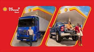 Logo de Shell V-Power Diesel e texto Novo aplicados em uma faixa amarela sobre fundo vermelho
