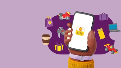Ilustração de uma mão segurando celular com logo Shell Box na tela e emojis dos benefícios em volta